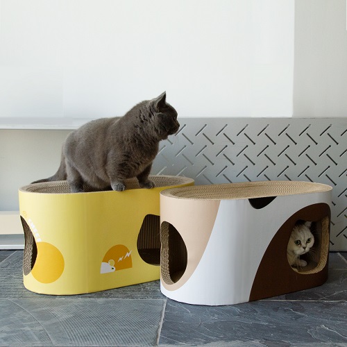 cat playing with Cat Scratcher